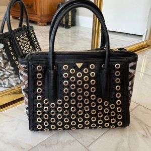 Sam Edelman designer handbag brown leather with gold rivets.